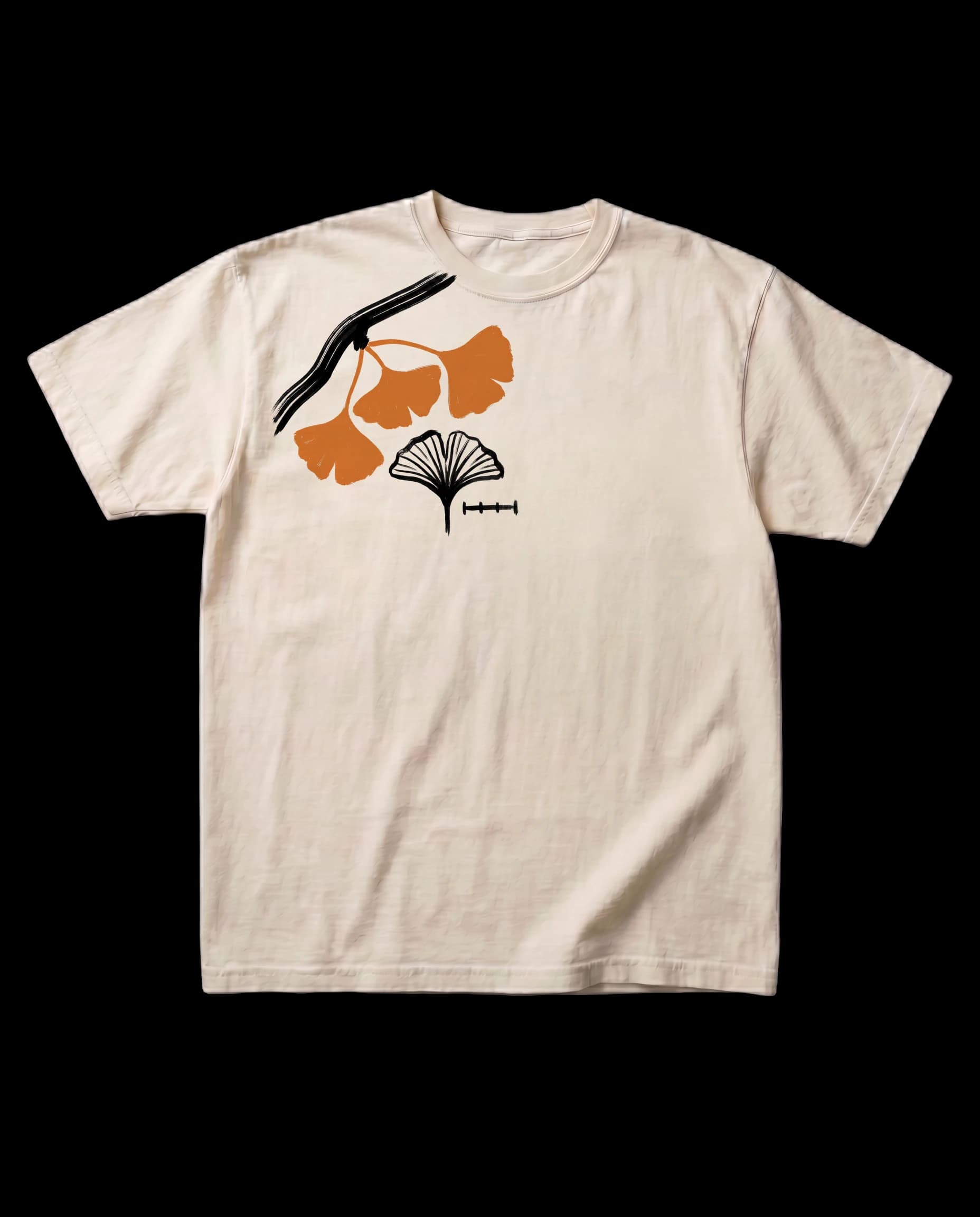 The Ginkgo Study tee in Bone, laid flat, with a print on the right chest: an ink ginkgo branch with three orange leaves, a line-drawn leaf study, and a small scale bar.