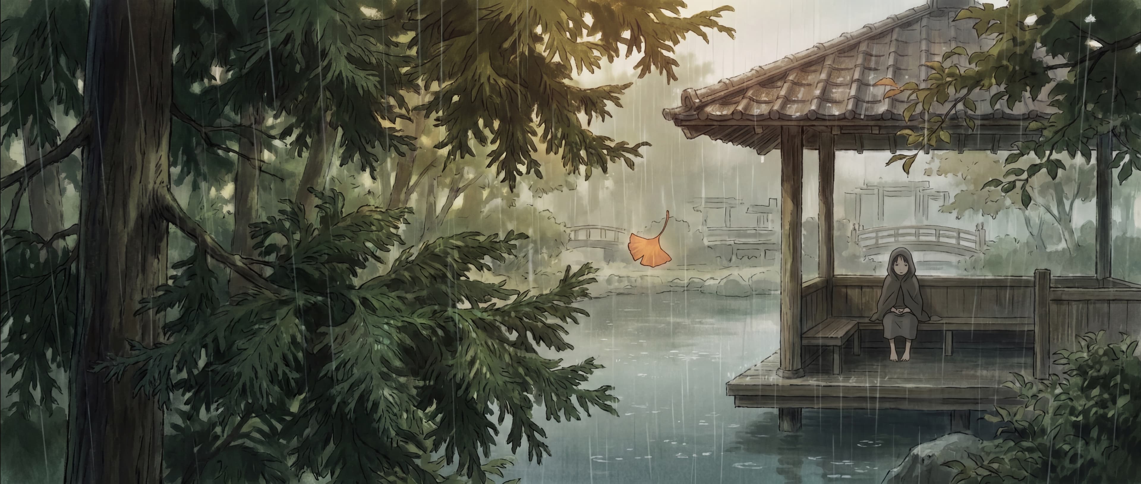 A wooden Japanese-park gazebo holding heavy summer rain. Lush cedar foliage frames the structure on the left; the gazebo sits in the right third with a small figure inside. A single warm-orange ginkgo leaf falls through diagonal rain. Painted Mushishi-watercolor register, 21:9 cinematic letterbox.